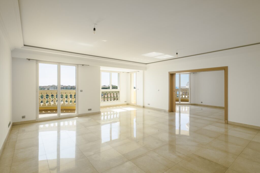 living room of the 4-bedroom apartment for sale in Oiseau Bleu