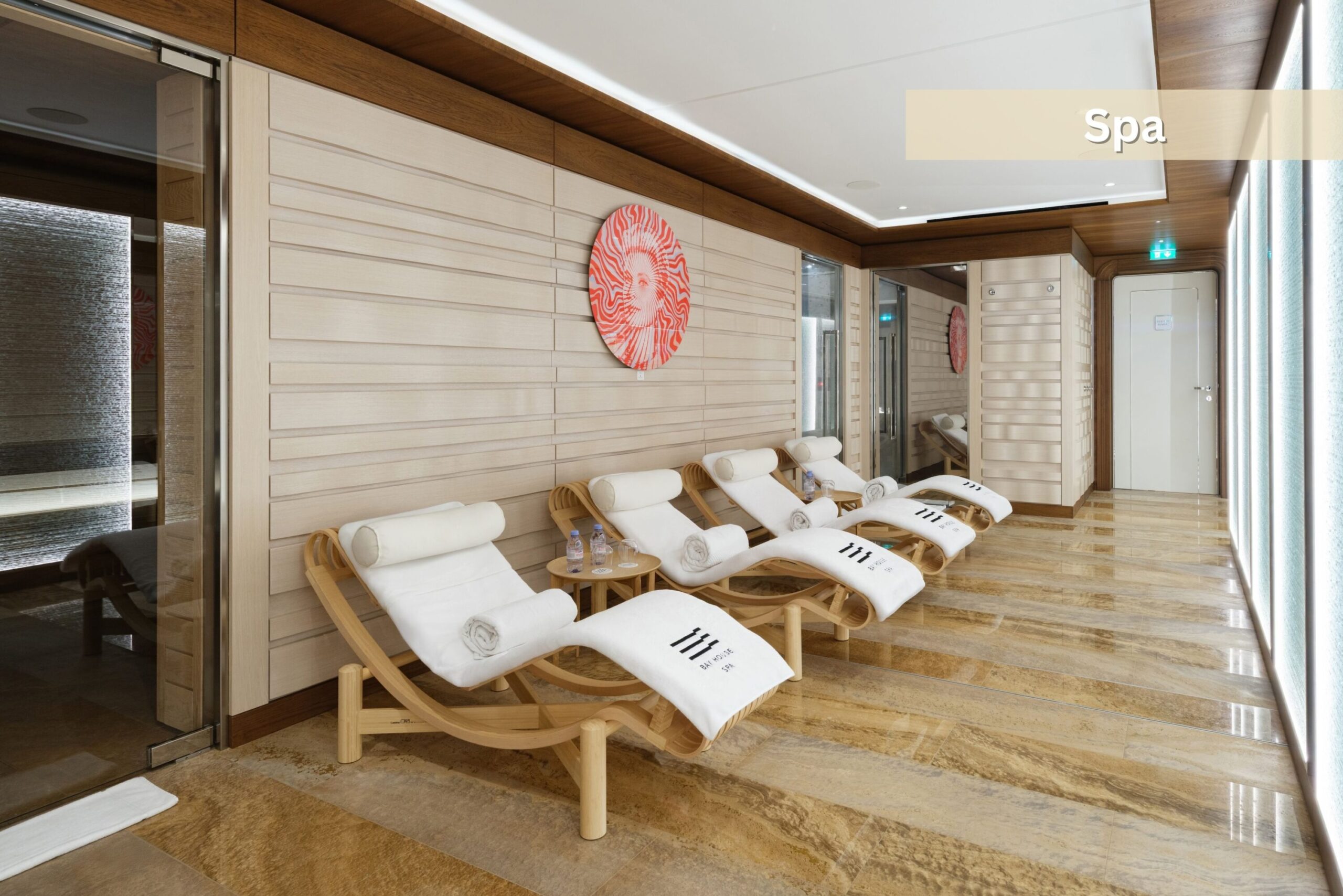 Bay House Monaco spa relaxation lounge with heated loungers and wellness area