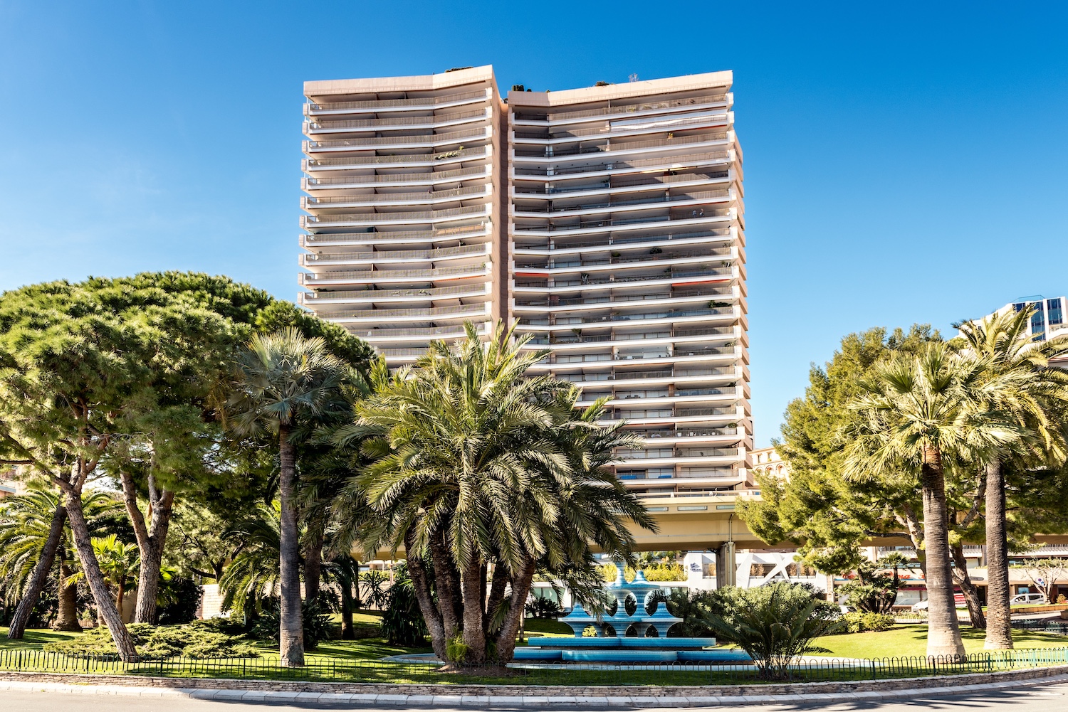 Le Mirabeau residential tower in Monte-Carlo Monaco surrounded by palm gardens