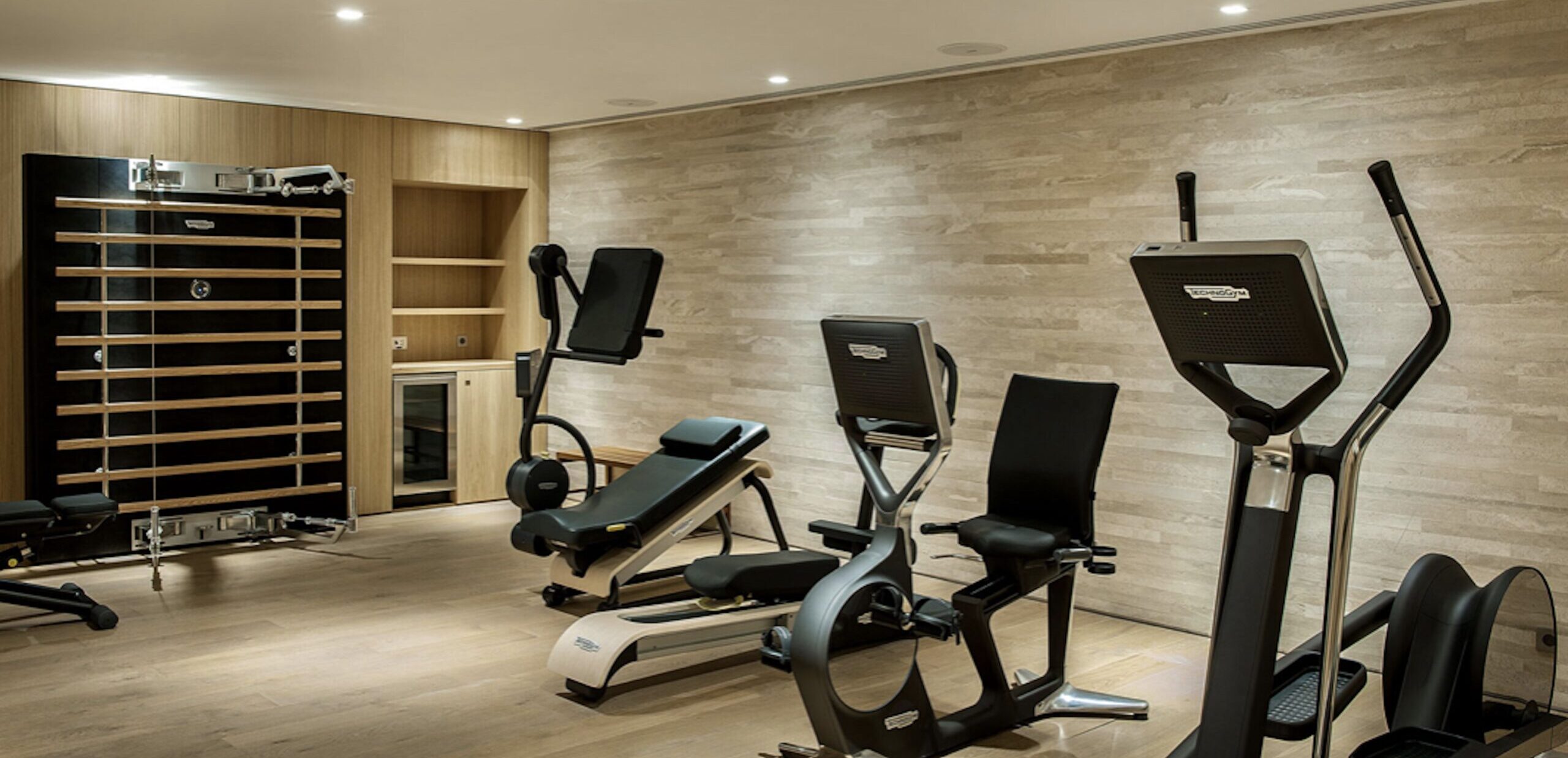 Black gym equipment in the fitness area in La Petite Afrique building