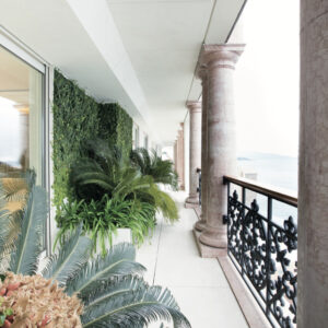 Palazzo Leonardo Monaco private terrace with marble columns, greenery and sea views