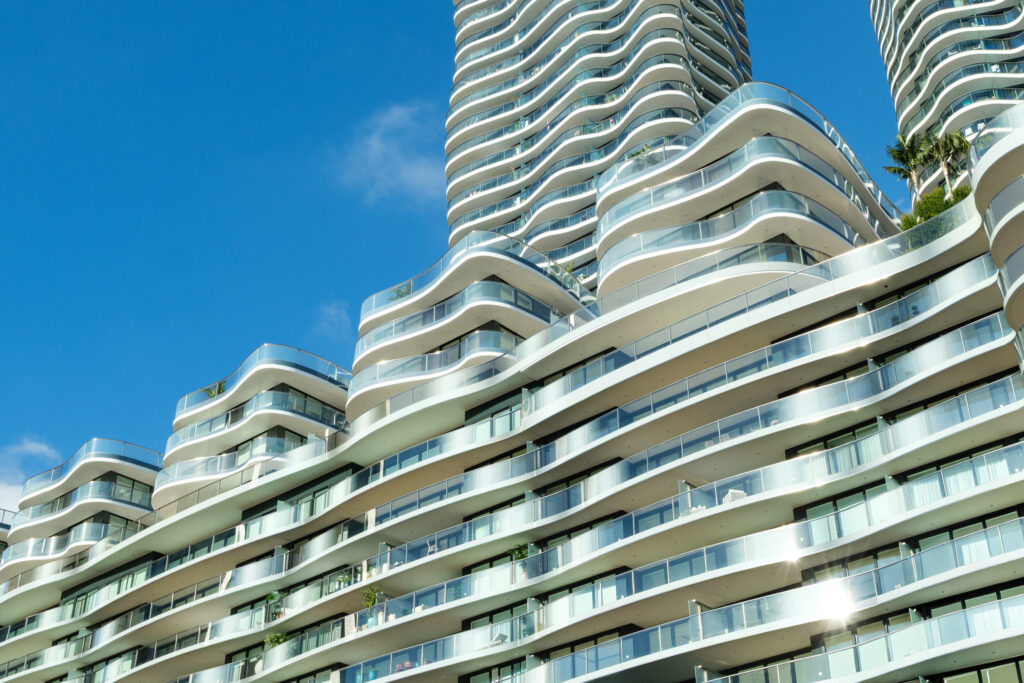 Bay House Monaco luxury residential towers with curved balconies and glass façades in Larvotto