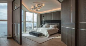 Bedroom and the view of the 4-bedroom apartment in Tour odeon - dark walls, luxury interiors