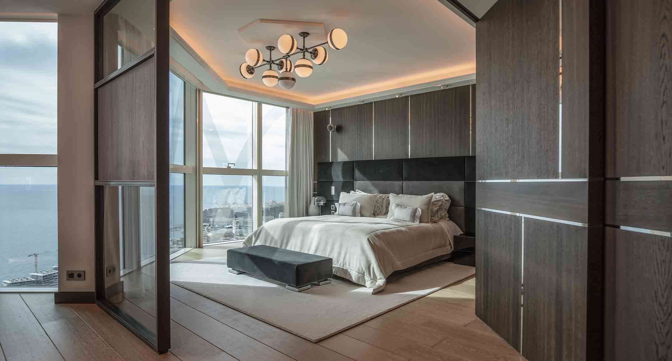Bedroom and the view of the 4-bedroom apartment in Tour odeon - dark walls, luxury interiors