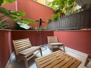 Terrace with wooden lounge chairs